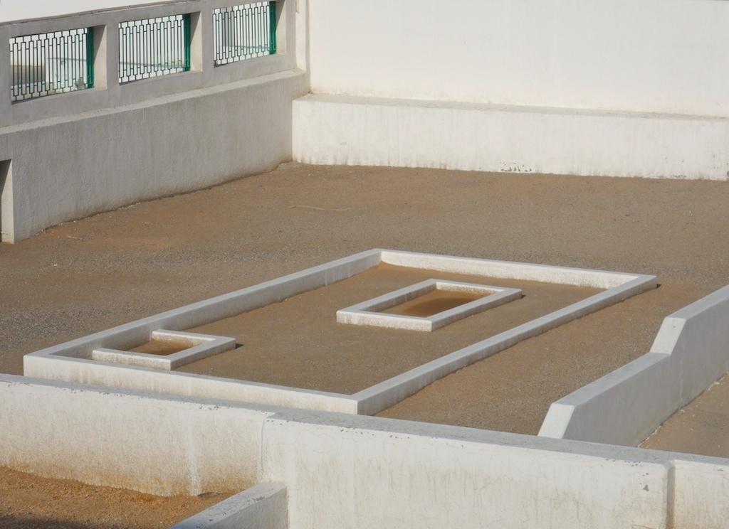 Pilgrims visiting Jannat al-Mualla